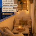 Un salon chaleureux avec des coussins colorés et des éléments décoratifs accueillants.