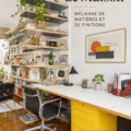 Intérieur chaleureux avec un mélange de finitions variées, incluant bois et métal.
